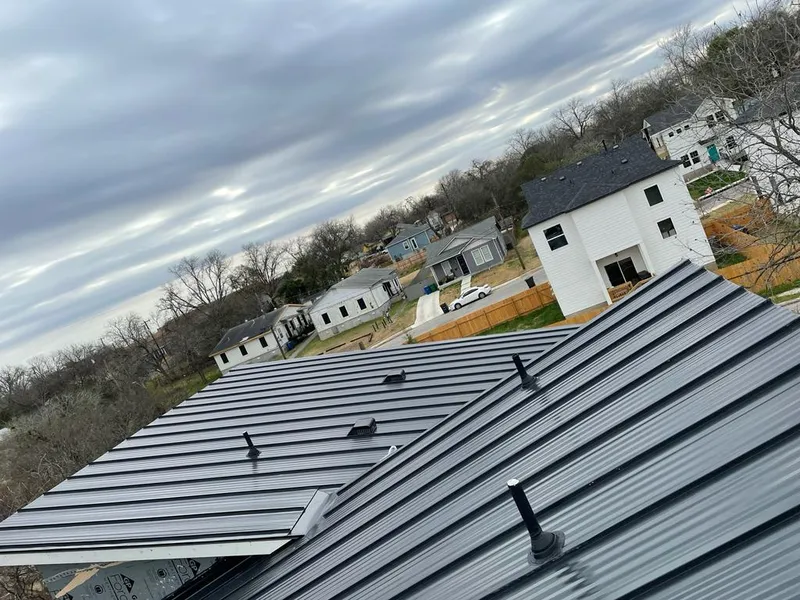 Standing seam metal roof panels with vents for Skylight Repair in Norridge